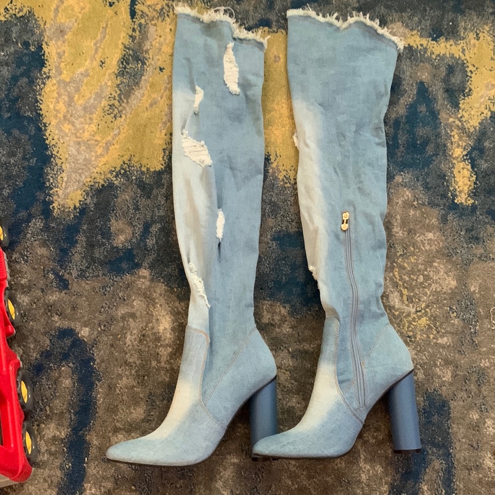 Distressed block heel jean boots